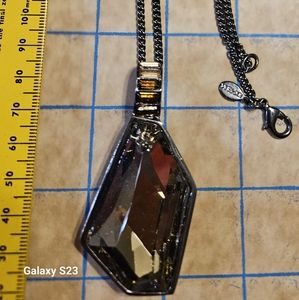 EXPRESS 36" long necklace.  Smokey color pendant with gunmetal color chain.